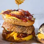 Bee Sting Breakfast Bagel Sandwich recipe with honey and spicy toppings